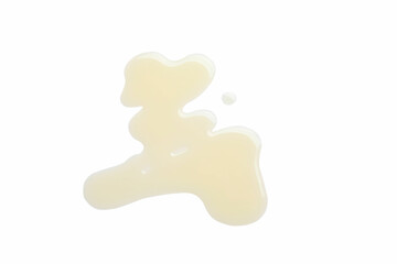 Spilled cooking oil on white background, top view