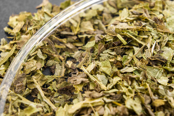 Medicinal milk thistle dried leaves. Alternative herb medicine ingredient