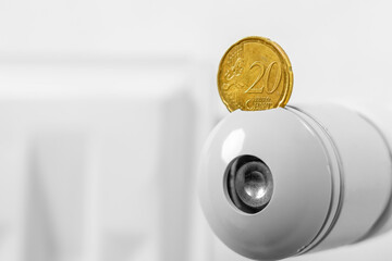 Coin with thermostat heating radiator