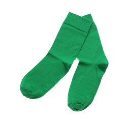 Green socks on white background, top view