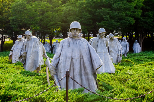 Washington, DC USA - August 6, 2017: Stainless steel sculptures depicting a squad of ground troops on patrol in the Field of Service at the Korean War Veterans Memorial on the National Mall