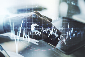 Multi exposure of abstract creative financial graph with finger presses on a digital tablet on background, forex and investment concept