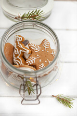 A glass jar with homemade tasty Christmas gingerbread