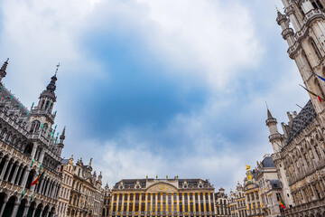 Wide angle view of the Grand Place in Brussels, Belgium with the Brussels Town Hall, Maison du Roi, and the House of the Dukes of Brabant