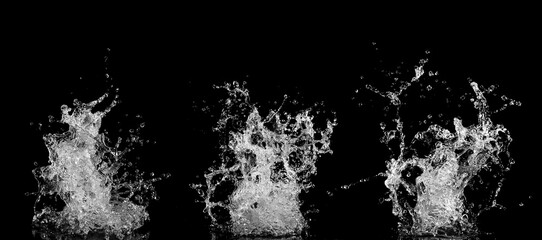 Water splashes isolated on black background.