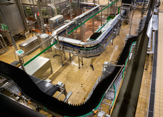 Bottling room of beer bottling line at factory