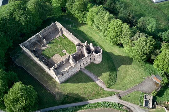 Balvenie Castle among green trees - drone photo