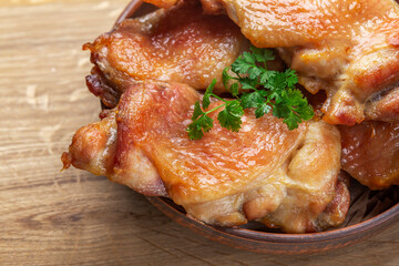 fried chicken meat with appetizing skin in oil