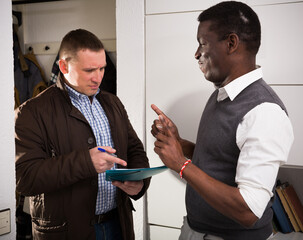 Confident African American man does not agreeing with claims made to him by landlord