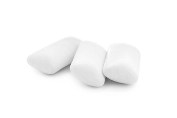 Three chewing gum pieces on white background