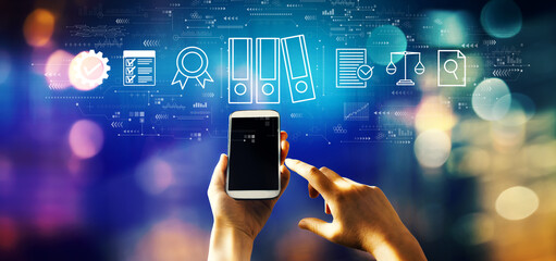 Compliance theme with person using a smartphone