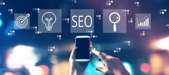 SEO concept with blurred city lights at night