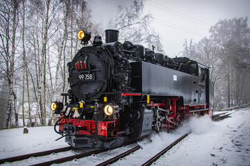 Fototapeta na wymiar Steam locomotive decorated for Christmas
