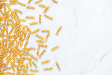 Gray background with whole grain pasta