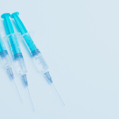 Medical syringe on a white background. A syringe for injection. The concept of health and beauty