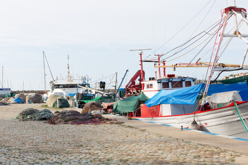 Fishing in port in the town of Sant Feliu de Gixols in the province of Girona, Catalonia, Spain.