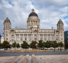 Fototapeta na wymiar Liverpool city centre - Three Graces, buildings on Liverpool's waterfront during day time, UK