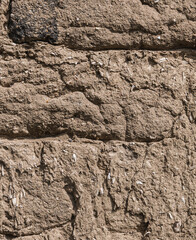Old weathered grungy clay wall texture 