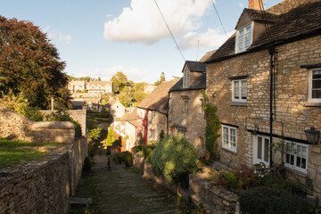 The Chipping Steps in Cotswold town of Tetbury, Gloucestershire, England, United Kingdom. Sunny day in Autumn. Select focus.