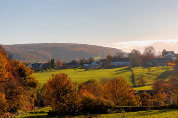 Autumn landscape of hilly countryside in Zuid-Limburg, Small houses on hillside with sunlight in the morning, Gulpen-Wittem is a villages in southern part of the Dutch province of Limburg, Netherlands