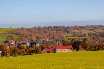 Foto auf Acrylglas Colorful Autumn landscape of hilly countryside in Zuid-Limburg, Small houses on hillside with sunlight in the morning, Partij a village in southern part of the Dutch province of Limburg, Netherlands. © Sarawut
