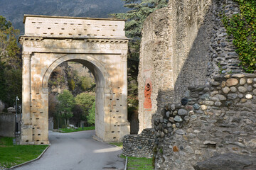 Fototapeta na wymiar Susa, Piedmont, Italy -10-22-2022- The Roman triumphal arch in honor of Octavian Augustus datable to the 1st century AD