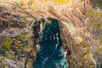 Aerial view of a cave in the cliffs of Valentia Island.
County Kerry, Ireland.
the cliffs.