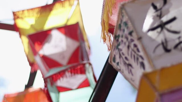 Asian lanterns on a sunny day - slow motion