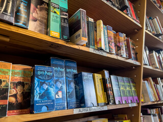 Fototapeta premium Redmond, WA USA - circa November 2022: Close up view of used audiobooks for sale inside a Half Price Books.