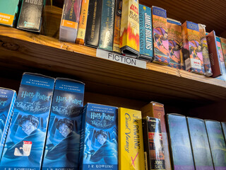 Fototapeta premium Redmond, WA USA - circa November 2022: Close up view of used audiobooks for sale inside a Half Price Books.