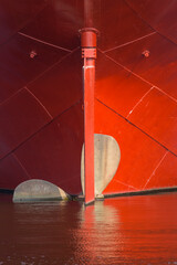 Propeller & Rudder Of A Red Ship