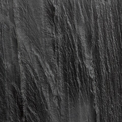 Dark grey black slate background or texture.