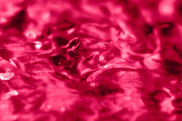 Viva Magenta gel texture. Monochrome trendy colour background. Gel texture monochrome. Trendy color 2023.
