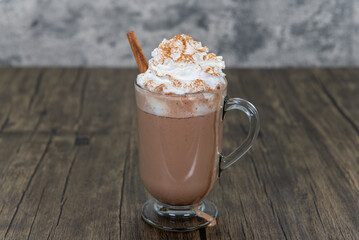 Rich chocolate mocha, topped with whipped cream and cinnamon stick will boost the energy to drink as a morning beverage