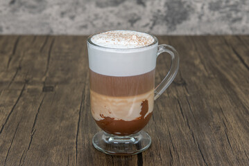 Morning energy boosting drink consisting of an espresso showing the delicious layers under the chocolate