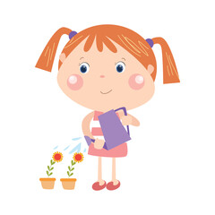 Cute little girl watering plants