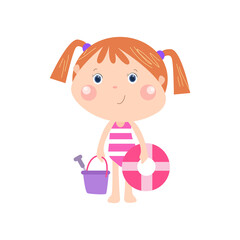 little girl playing on the beach