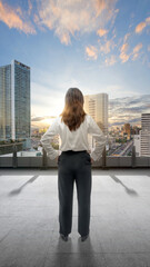 Fototapeta na wymiar Rear view of Asian businesswoman standing
