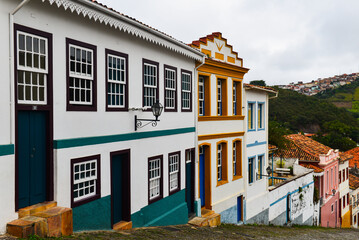 An overcast afternoon on a steep street in the historic, World Heritage-listed Ouro Preto colonial...