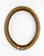 Old antique oval wooden picture frame isolated on white background.