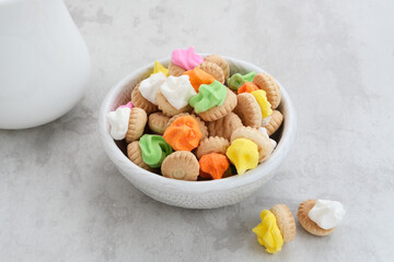 Gemrose or button cookies topped with colorful icing sugar. Indonesian traditional biscuits
