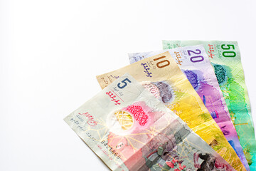 Group of money Maldives banknotes and coins on a white background. Maldives Currency rufiyaa note and coins, Maldivian rufiyaa money. Money and finances concept ,space for text.