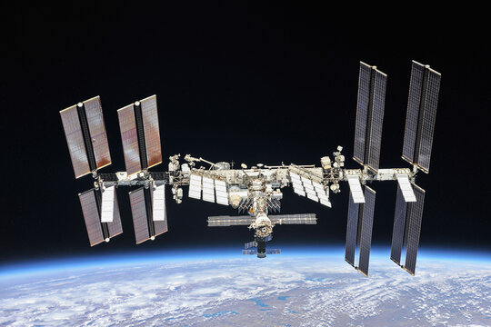 International space station orbiting the planet Earth. ISS. Dark background, soft stars. Digitally enhanced. Elements of this image furnished by NASA