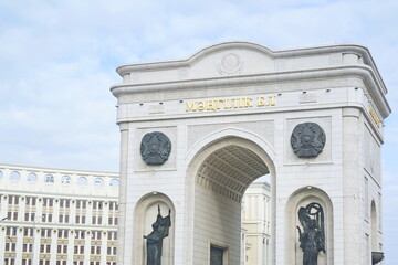 Fototapeta premium Astana, Kazakhstan - 10.17.2022 : A triumphal arch with an inscription in Kazakh - Mangilik El, dedicated to the independence of the country.