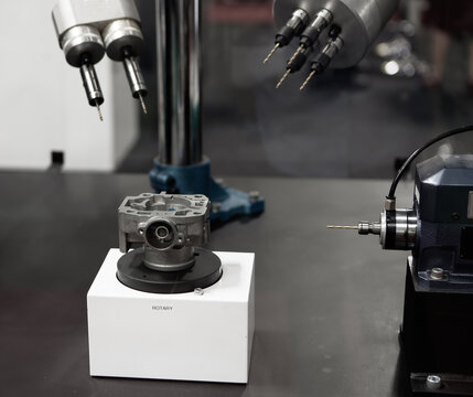 CNC multi spindle rotary drilling workpiece. Industrial manufacture.