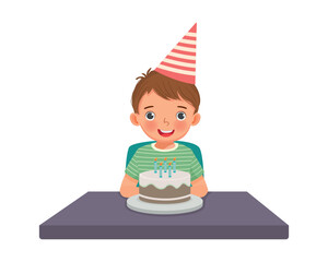 cute little boy having fun celebrating his birthday party