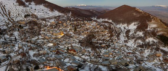 Aerial view of traditional architecture  with  stone buildings and the famous local school with a...