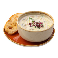 Bowl of gourmet mushroom cream soup with bread