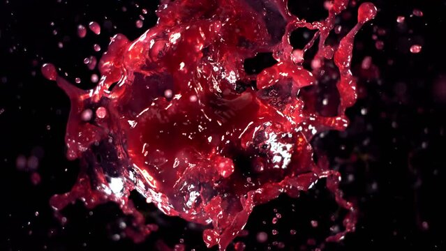 Black Grape Juice Splashing. Slow motion.
