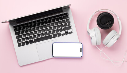 Laptop, smartphone, headphones and coffee cup